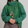ADARA sweater with high collar in green knit. Natural fabrics, original design, handmade embroidery