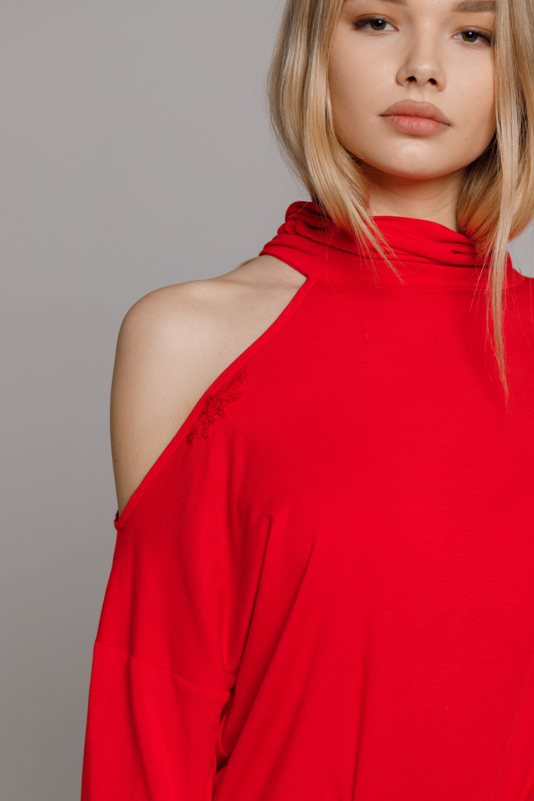 Red ALORA blouse with cut-out shoulder. Natural fabrics, original design, handmade embroidery