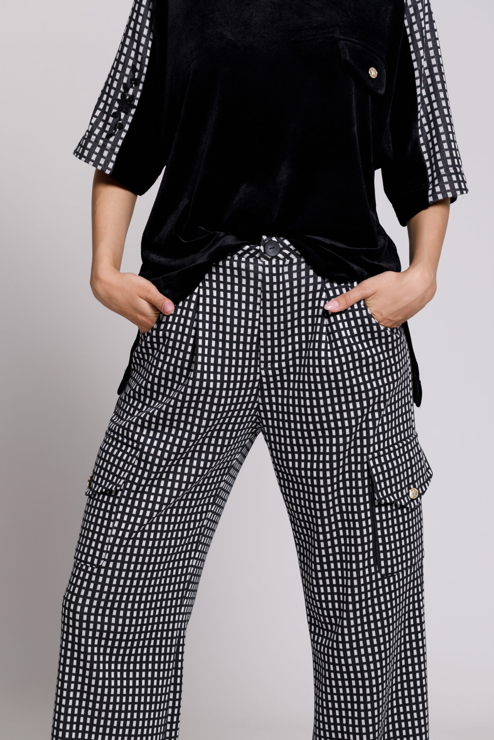 ROWAN casual black and white trousers with bells. Natural fabrics, original design, handmade embroidery