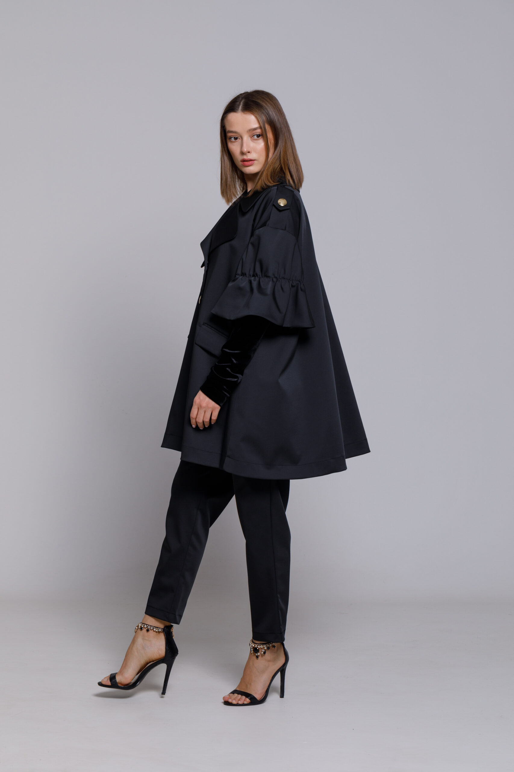 Black CALLIOPE jacket with ruffles on the sleeve. Natural fabrics, original design, handmade embroidery